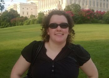 Picture of ECI staff member Amy Ouellette in front of the U.S. Capitol Building in Washington D.C.