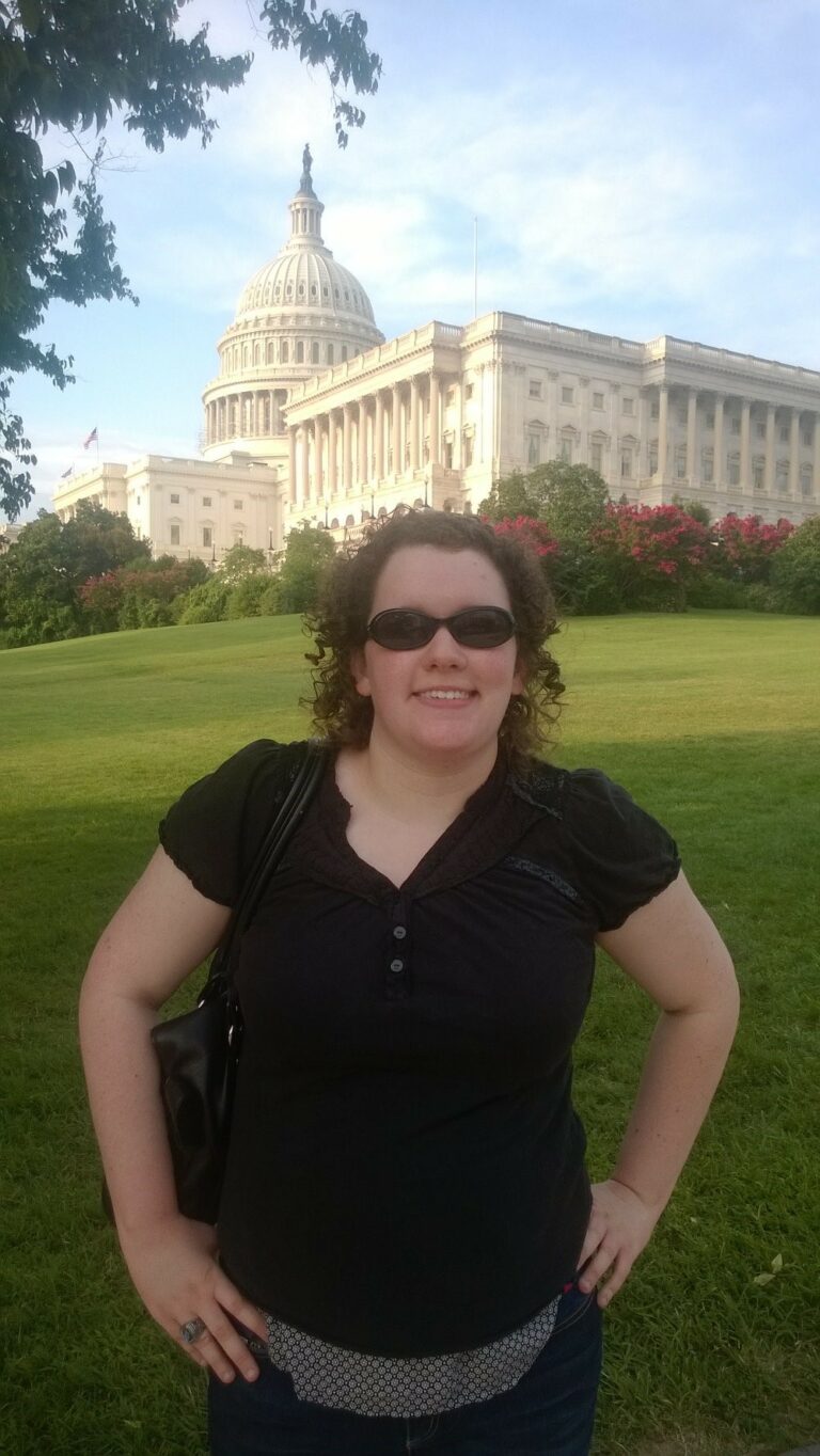 Picture of ECI staff member Amy Ouellette in front of the U.S. Capitol Building in Washington D.C.