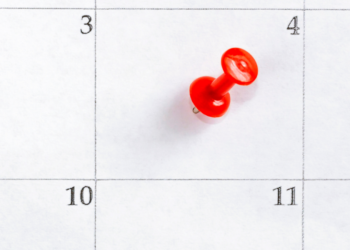 Calendar with pin marking date
