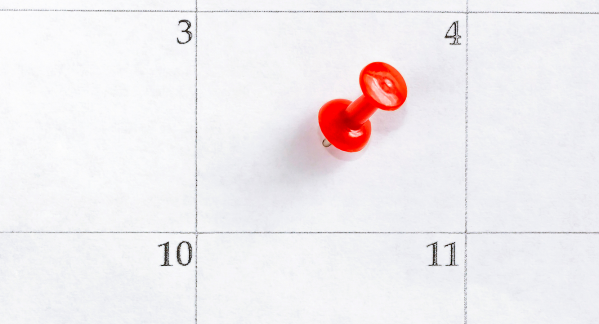 Calendar with pin marking date